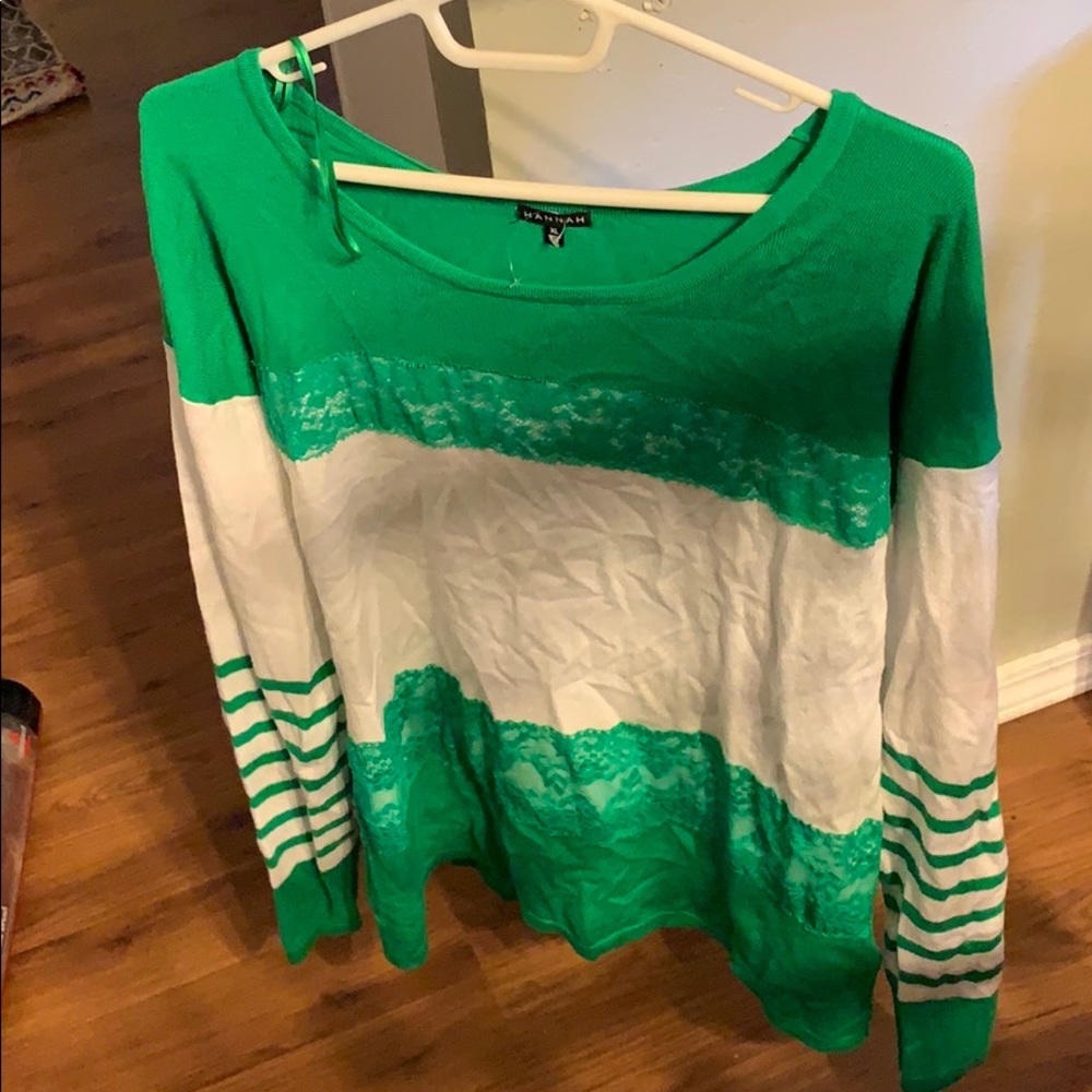 Green long sleeve sweater.